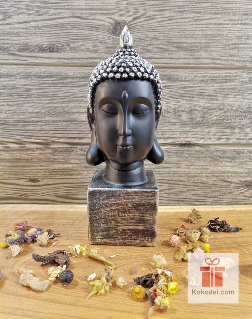 Статуетка глава на Буда